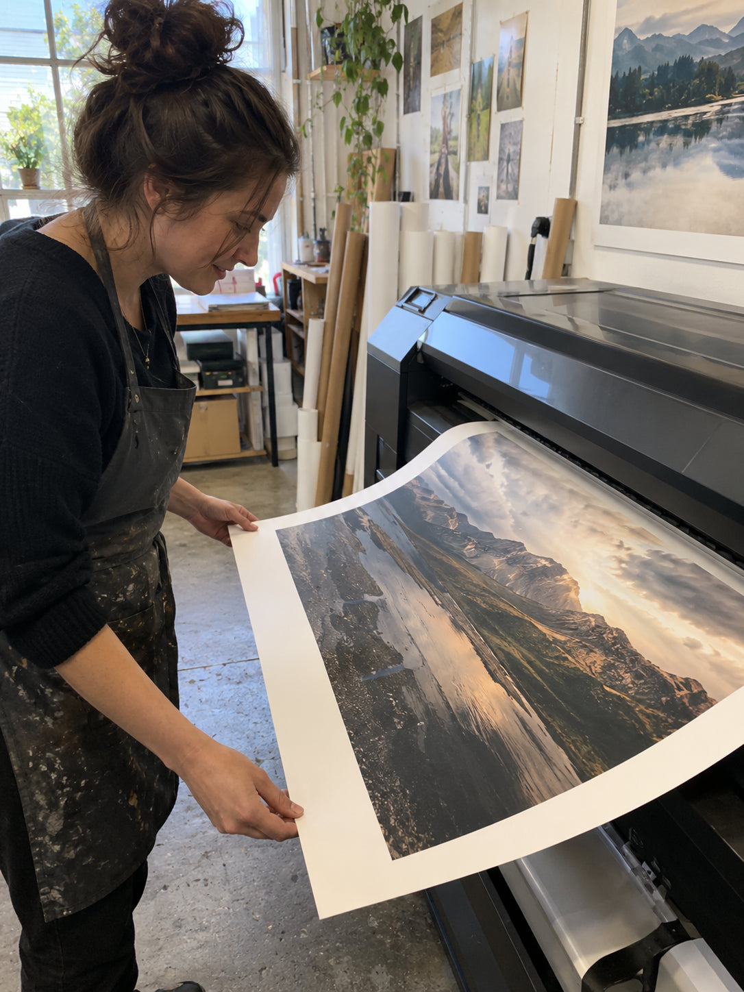 Professional wide-format printer producing a fine art print